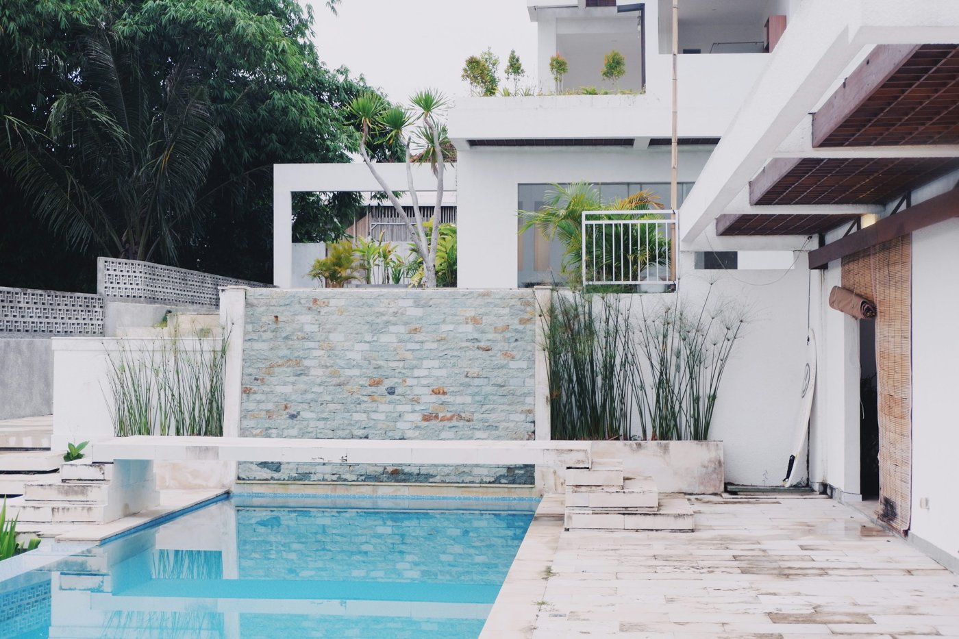 Villa photographed by Iosi Pratama; illustrative stock image, not a Manozake project